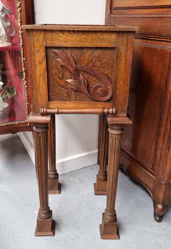 Wooden Arts and Crafts pedestal planter stand with decorative carvings. Sourced locally and is in good original condition.