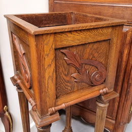 Wooden Arts and Crafts pedestal planter stand with decorative carvings. Sourced locally and is in good original condition.