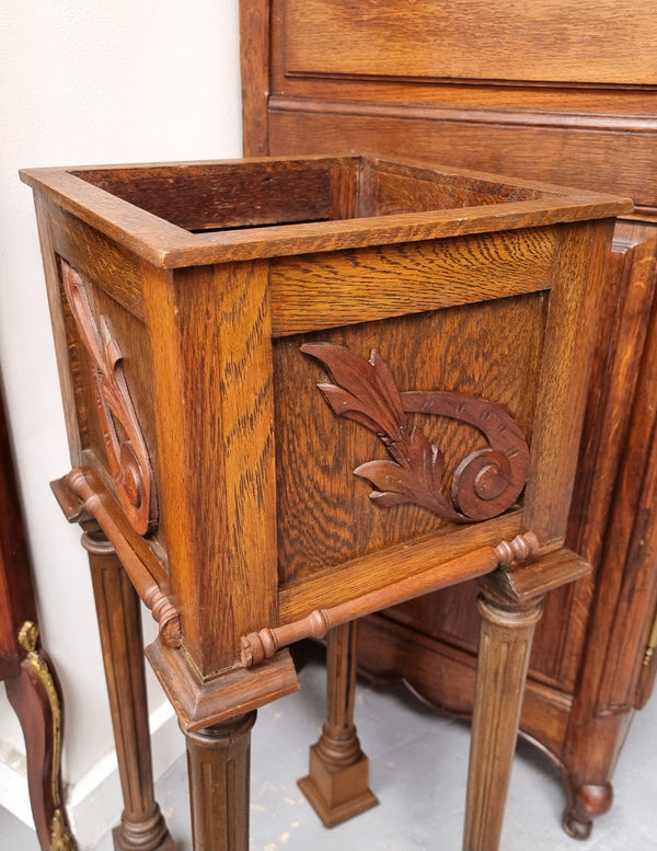 Wooden Arts and Crafts pedestal planter stand with decorative carvings. Sourced locally and is in good original condition.