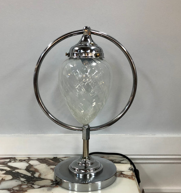 Decorative Art Deco chrome and glass table lamp that has been rewired and is in good original condition.