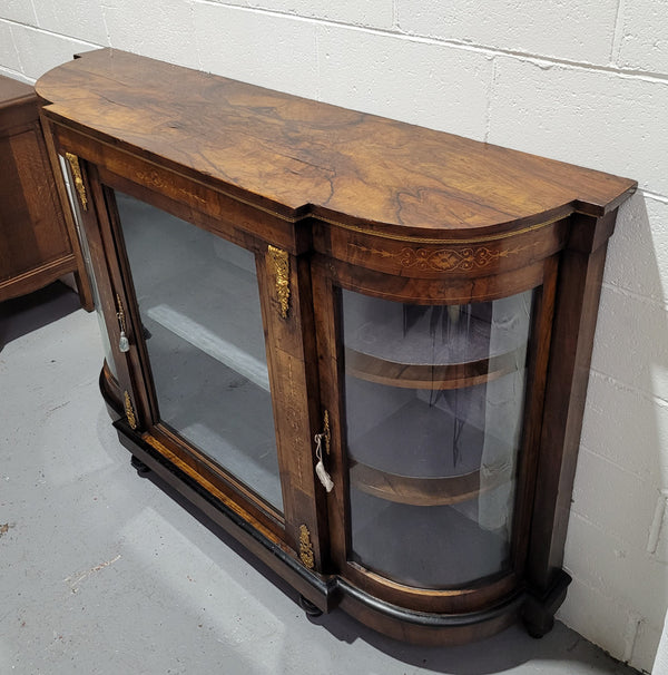 Victorian Rosewood inlaid side cabinet/credenza with velvet lined shelves and gilt mounts. It has been sourced locally and is in good original condition with loads of character.