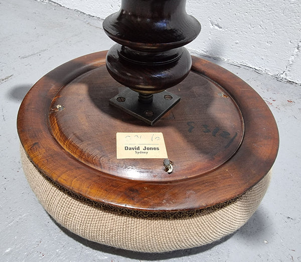 Beautiful Late Victorian Floral tapestry covered revolving piano stool. It is in very good original detailed condition. It has a original David Jones label underneath .