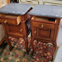 Pair of Walnut Louis XV style grey marble top bedside cabinets. Single drawer, one cupboard and lovely French cabriole legs. They have been sourced from France and are in good original condition.