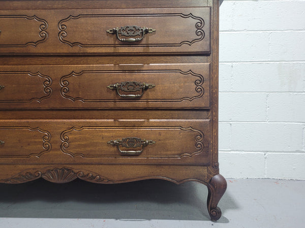 Louis XV style French Oak chest of three drawers that has been sourced from France. It is in good original condition and has been detailed.
