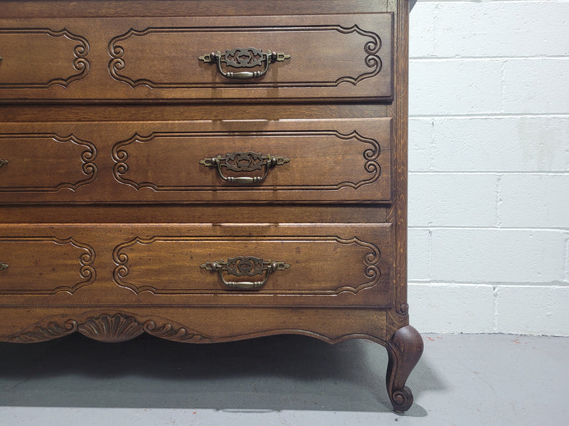 Louis XV style French Oak chest of three drawers that has been sourced from France. It is in good original condition and has been detailed.