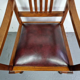 A very comfortable Black Wood Period leather seat armchair. In leather and chair are in good original condition.