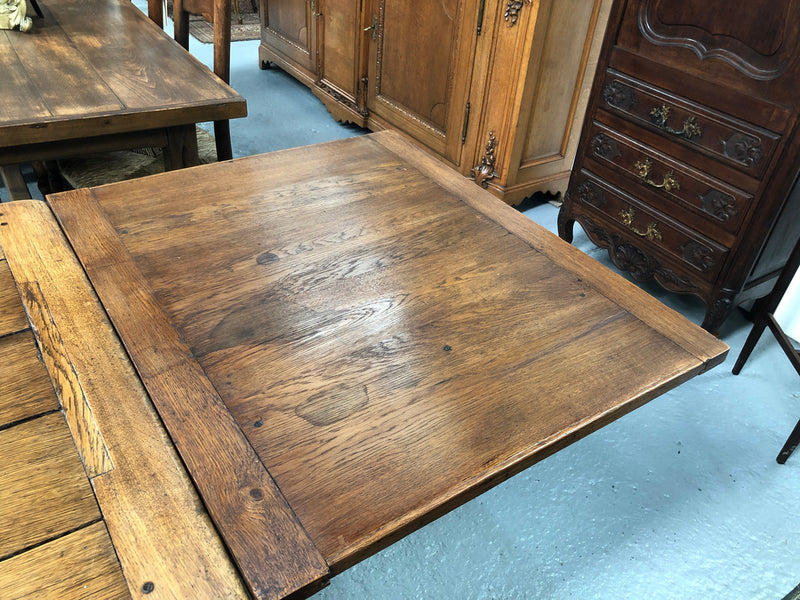 Beautiful rustic 19th century French oak farmhouse extension table.It has two pull out extension leaves that extend the table to 290 cm long. It also a single drawer for storage and is in good original detailed condition. measures 290 cm extended.