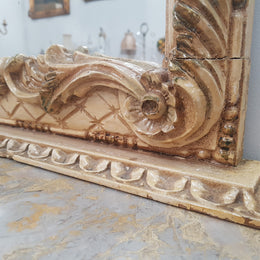 Beautifully carved Italian Rococo style painted console/hall table and mirror. An amazing coloured marble top showing sections of gold veins and is in good condition. Mantle mirror is retaining it's original mirror and showing ages spots.