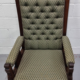 Pair of Edwardian button back Walnut armchairs. They are in good original condition with clean upholstery.