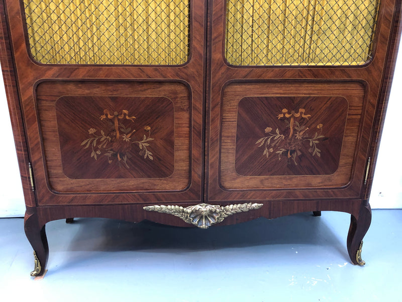 Beautiful 19th Century French Louis XV style Mahogany Blind Bookcase. This piece has lovely inlaid doors and ormolu mounts, marble top and four adjustable shelves. In good original detailed condition.
