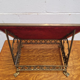 Antique French brass Gothic Revival book stand with red velvet. It has sourced from France and is in good original condition.