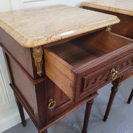 French Oak pair of Louis 16th style marble top bedsides with stunning bronze mounts. They have been sourced from France and are in good original detailed condition.