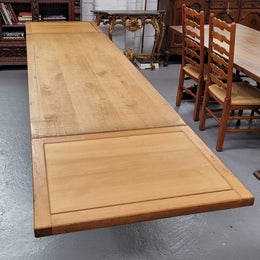 Stunning French Oak Farmhouse table with two extension leaves. When fully extended the table measures to a massive 339.5 cm long. Sourced from France and in good original detailed condition.