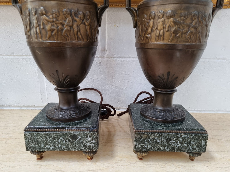 Antique pair of beautiful French urns on marble table\bedside lamps. In good original detailed working condition .