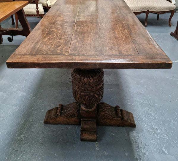 A beautifully carved 19th Century French Oak farmhouse table with a "bulbous base". It is in very good original detailed condition.