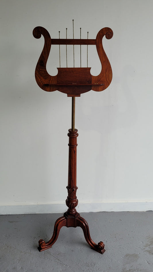 Elegant Mahogany and brass carved reproduction music stand excellent condition.
