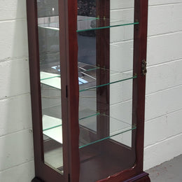 Vintage Mahogany petite display cabinet with three solid glass shelves. Ideal for a small area and is in good original detailed condition.