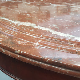 A superb early 19th century French Louis Philippe mahogany centre table, with original round carved rough marble with reeded-edge and is in good original condition.