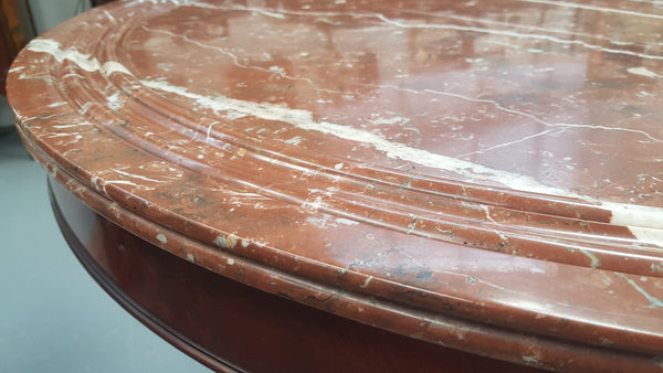 A superb early 19th century French Louis Philippe mahogany centre table, with original round carved rough marble with reeded-edge and is in good original condition.