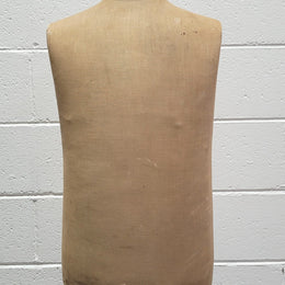 Vintage fabric covered child mannequin on adjustable wooden base. In good original condition.