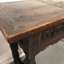 Spanish late 19th century carved oak three drawers console/side table. Superb wrought iron undercarriage. In good condition. Circa 1900's.