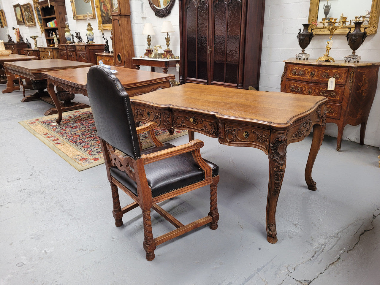 19th Century Louis 14th style quality French carved Oak bureau plat. It has three lockable deep drawers and beautifully carved legs. It has been sourced from France and is in good original detailed condition.