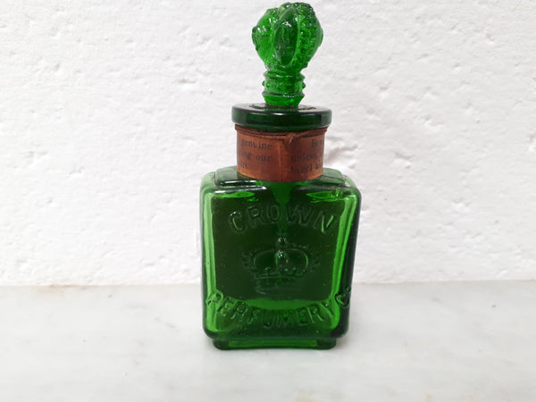Victorian green glass Crown perfume bottle. In good original condition.
