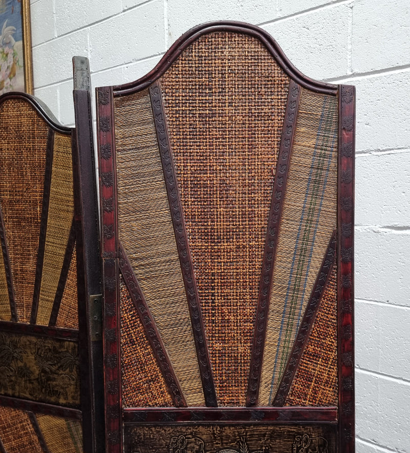 Vintage three panel room divider with elephants made from rattan and wood. It has been sourced locally and is in good original condition.