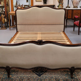French Louis XV style queen size upholstered bed. Upholstery is in good condition and bed is complete with custom made slats. Just place your mattress on top.