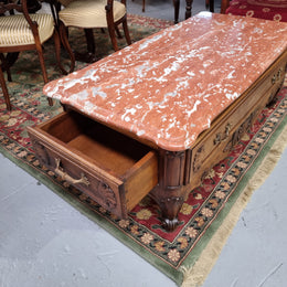 Amazing original walnut Louis XV style coffee table with a marble top, one drawer on either end and a faux drawer at the front. In good original detailed condition, sourced in France.