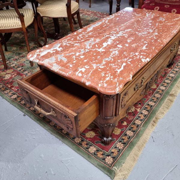 Amazing original walnut Louis XV style coffee table with a marble top, one drawer on either end and a faux drawer at the front. In good original detailed condition, sourced in France.