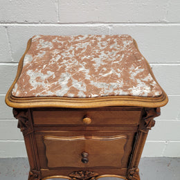 Single French Louis XV style Walnut inset marble top bedside. It has one drawer and one cupboard. It is in good original detailed condition.