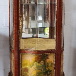Lovely Vintage French Louis XVth style Vitrine. It has lovely gilt mount details and two glass shelves with room also for storage in good original condition.