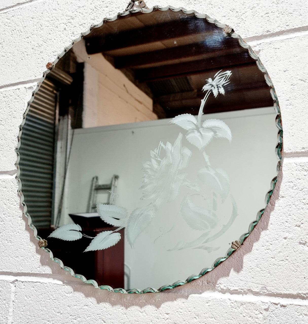 Vintage Art Deco round wall mirror with pie crust edge and etched floral design . In good condition, please see photos .