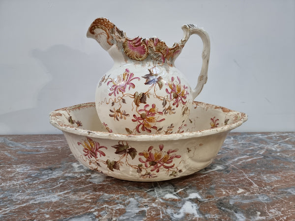 Delightful late Victorian floral English ceramic Jug and Basin set. Marked on base B&T. In good condition please view photos as they help form part of the description.