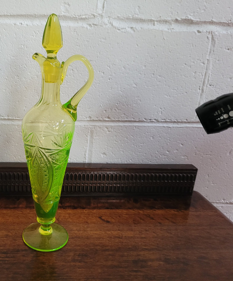 Stunning Uranium glass decanter and stopper. Great shape and height of 30.5cm