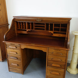 An Antique American Oak Cutler Roll Top Desk
