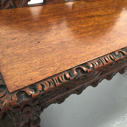 Superb 19th Century Gothic style hall/console table. It has umbrella and walking stick holders on both sides. In good original detailed condition.