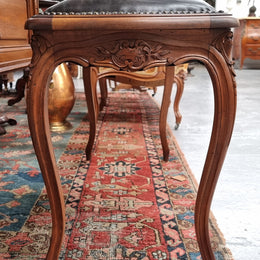 Impressive French Louis 15th style walnut upholstered duet leather stool. Very Good Condition.  Circa: 1930’s, sourced in France.
