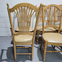 French country style set of six dining chairs and two carvers with leather seats. They are all in good original detailed condition.