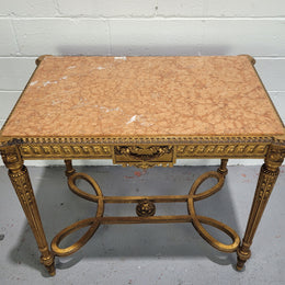 Antique French Louis XVI style gilt center table with a stunning marble top. Featuring stunning ornate carving and it is in great original condition