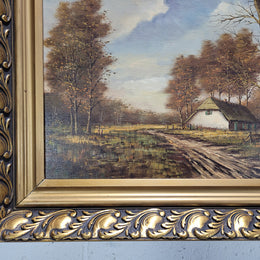 Stunning French oil on canvas painting of a cottage landscape, in great original gilt frame.