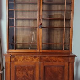 Rare early Australian colonial full Cedar bookcase. Plenty of storage underneath and glass top doors open up too three fully adjustable shelves. In good restored condition.