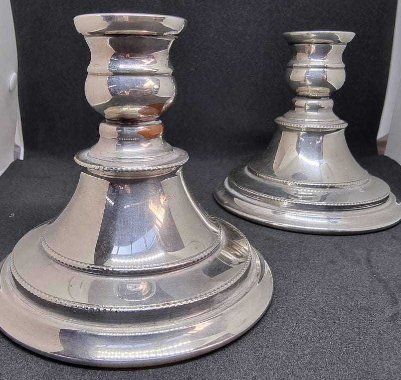 Beautiful pair of silver plate Walker and Hall candle Holders which are nice and heavy and in good condition.