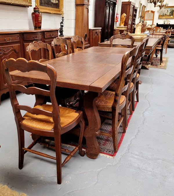 Purchased from France we have this amazing French Oak Spanish style farmhouse table featuring striking iron work underneath. It has been finished with an oil & wax finish making it more water resistant, stain resistant and durable then a natural wax finish. It can sit 6-8 people comfortable and is good restored condition.