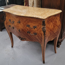 An elegant French Louis XV style kingwood two drawer commode with beautiful decorative inlay and ormolu mounts. Stunning coloured marble top and is in good original detailed condition.