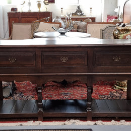 A very hard to find Vintage English kitchen dresser base of narrow proportions, sourced from France. In good original detailed condition.