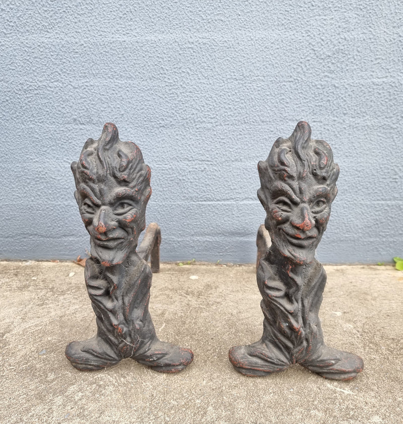 Fabulous rustic pair of French cast iron fire dogs. They are in good original condition.
