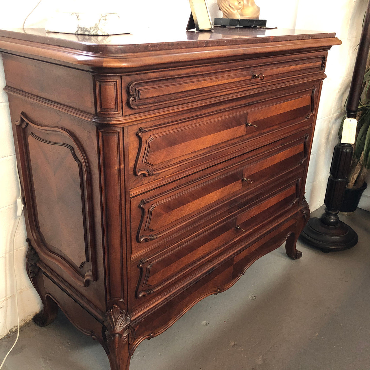 19th Century French Walnut five-drawer marble top commode. In good original detailed condition.