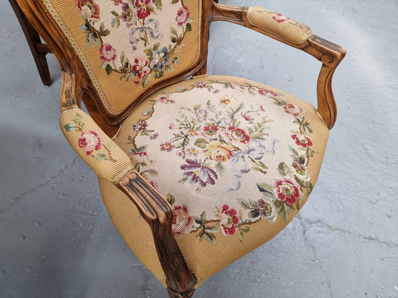 Louis XV style Walnut and tapestry armchair. Very comfortable to sit in and tapestry is in good original used condition.